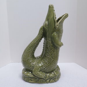 green ceramic alligator shaped jug