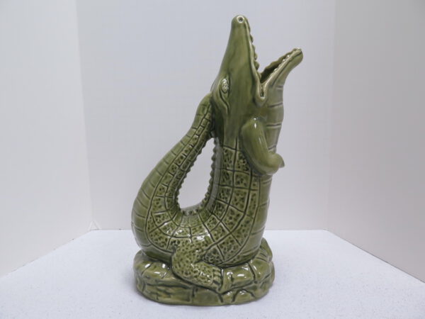 green ceramic alligator shaped jug