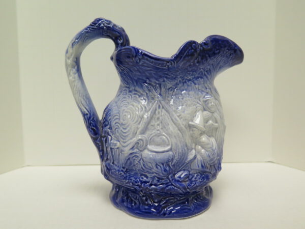 blue and white ceramic pitcher