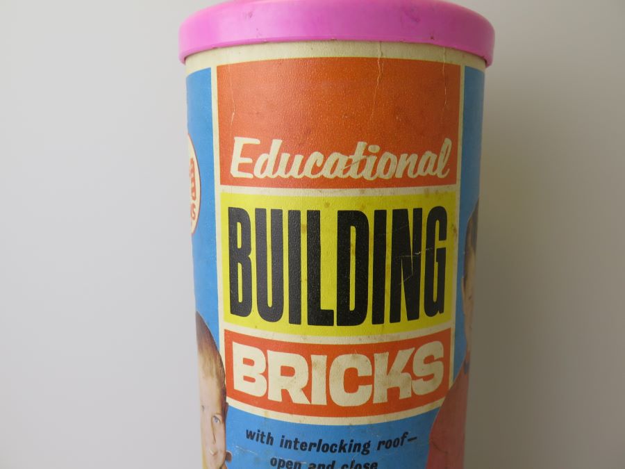 container of plastic toy bricke