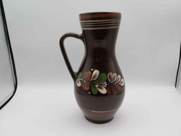 brown clay pitcher