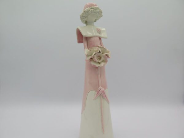 porcelain figurine lady with bouquet