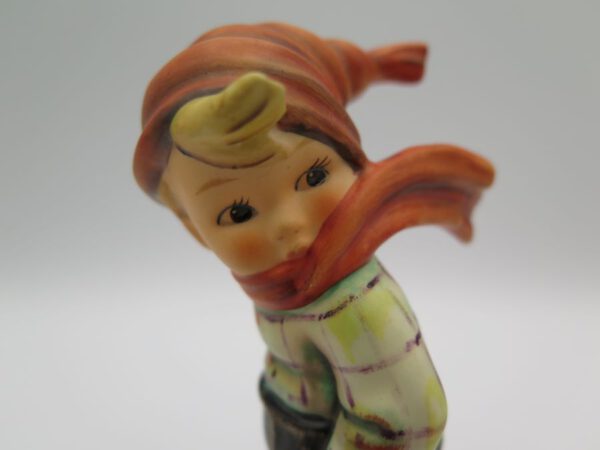 ceramic figurine of a boy