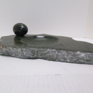 green jade trinket tray with egg shaped jade sphere on top