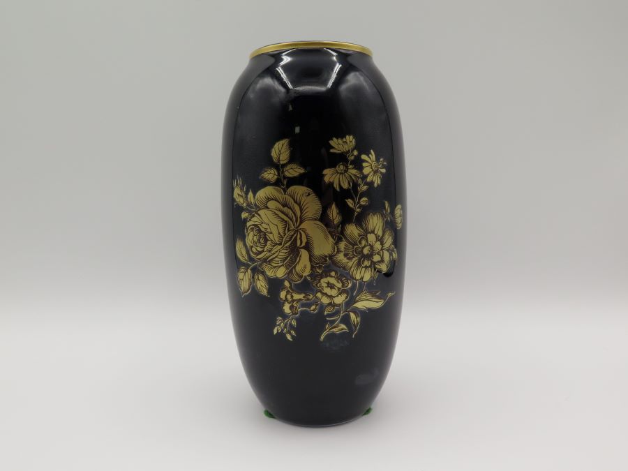 blue ceramic vase with gold flowers